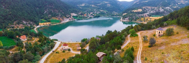 a view of a lake from the top of a mountain