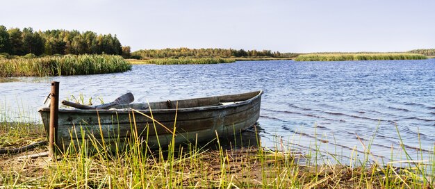 View of the lake with an abandoned boat