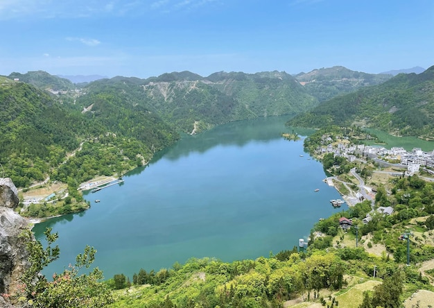 A view of a lake with mountains in the background