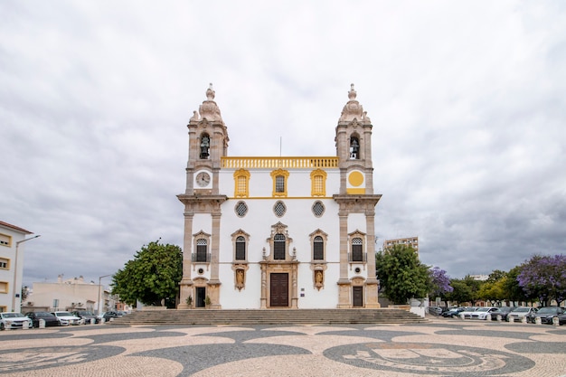 View of the landmark church of Carmo located in Faro, Portugal.