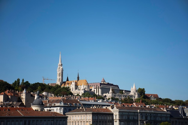 View landscape and cityscape of Budapest old town and Budapest Castle Hill or Buda Castle Royal Palace with Danube Delta river and Budapest Chain Bridge with tour cruises in Budapest Hungary