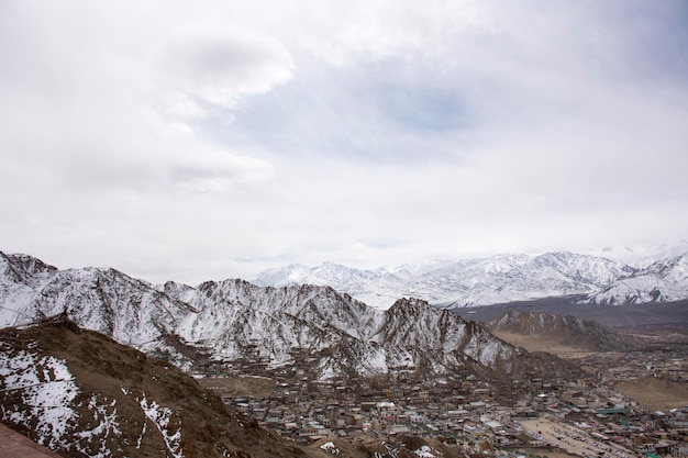 View landscape and cityscape of Leh Ladakh Village with high mountain range from viewpoint Tsemo Maitreya Temple or Namgyal Tsemo Monastery while winter season in Jammu and Kashmir India