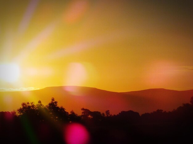 Photo view of landscape at sunset