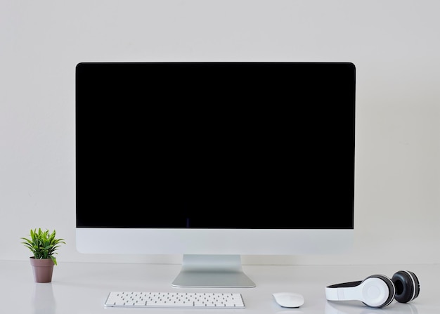 Photo view of laptop on table against white background