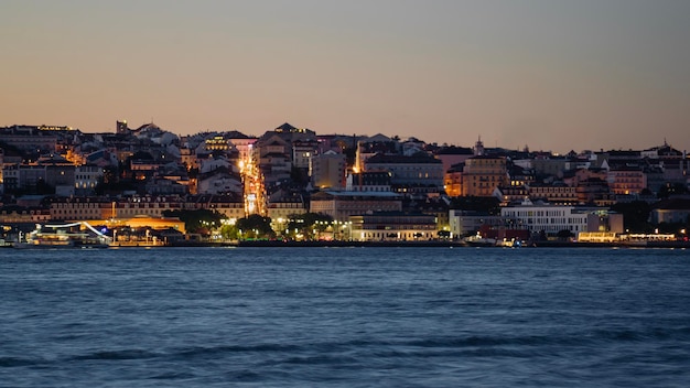 View of Lisbon city from Cacilhas at dusk Concept for travel in Portugal and visit Lisbon