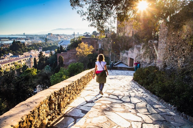 view over Malaga at sunset travel banner