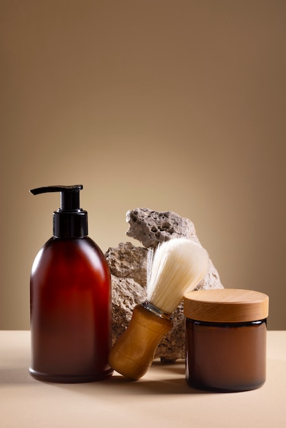 Photo view of male beauty products with rock or stone display