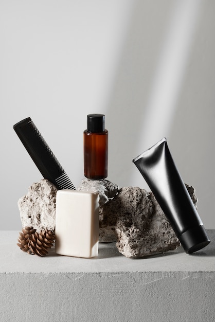 Photo view of male beauty products with rock or stone display