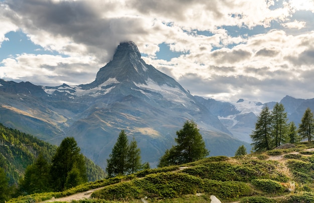 View of the Matterhorn mountain from a panoramic trail near Zermatt in Swiss Alps