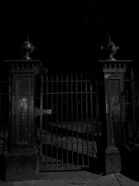 Photo view of metal gate at night