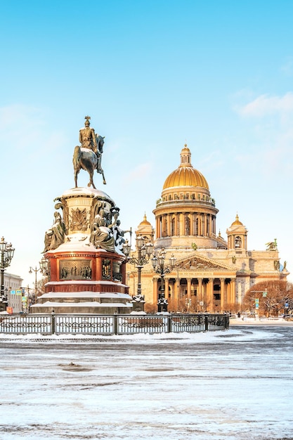 View of the monument to nicholas and st isaacs cathedral on a
snowy winter day in st petersburg