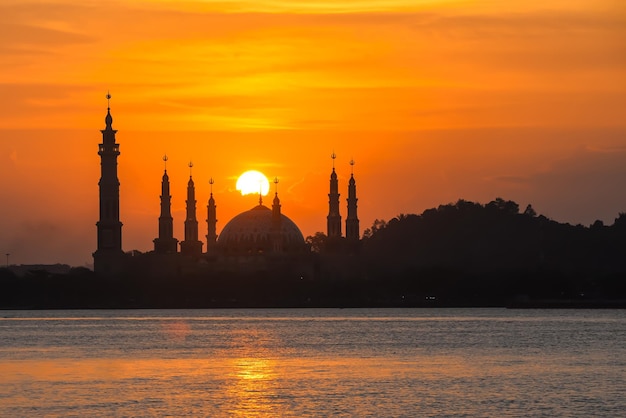 View of mosque at sunset