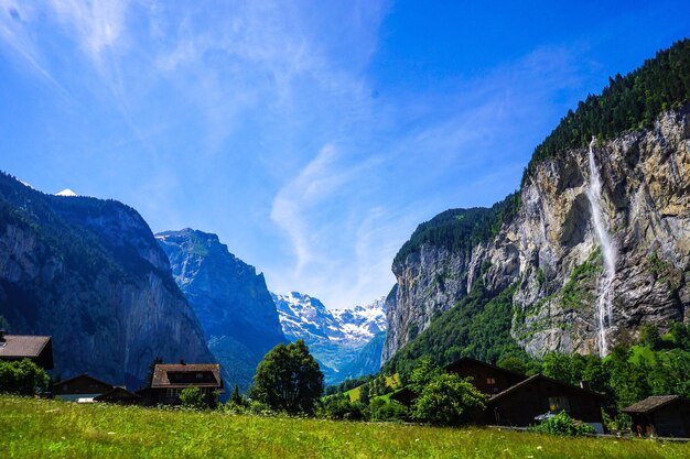 View of mountain range against blue sky