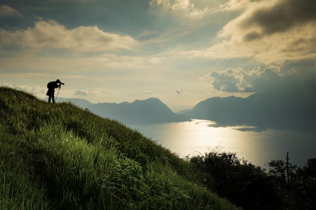 view of the mountains and lake in sunset