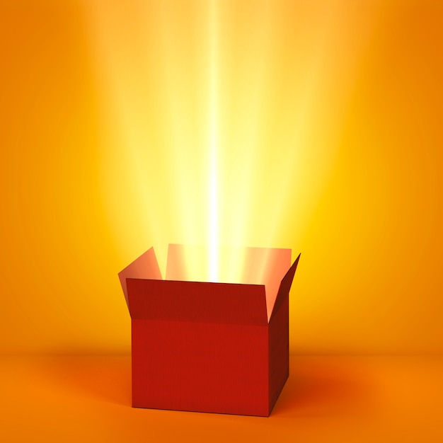 Foto vista della scatola di cartone misteriosa con luce scintillante proveniente dall'interno
