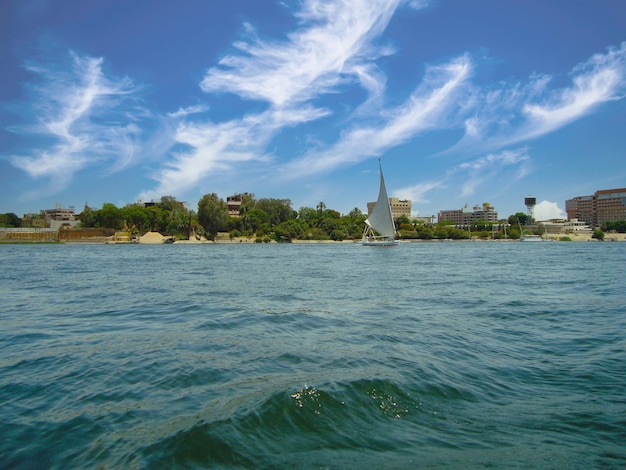 View of the Nile River and the traditional Egyptian felucca boat