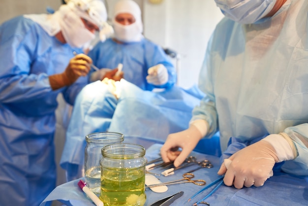 View of the nurse's operating room table, tools and medicines