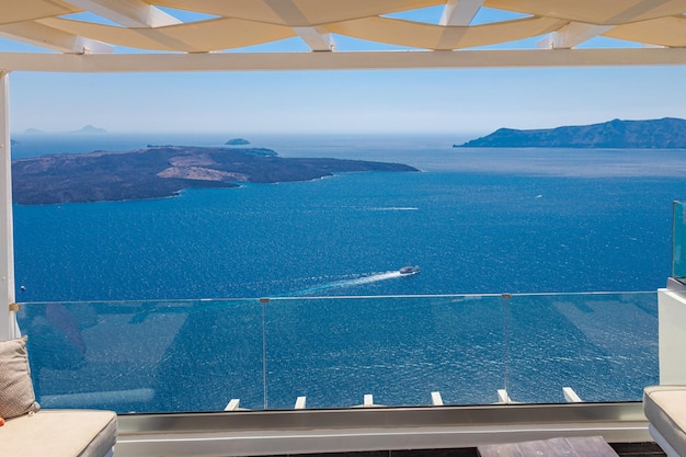 View in Oia, Santorini, Greece, terrace with blue sea view over the volcano