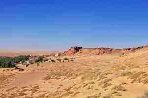 Photo the view on old fortress in timimun abandoned city in sahara desert, algeria