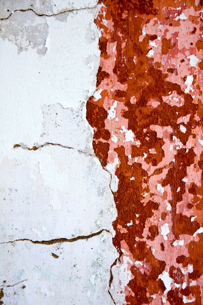 View of an old and peeled painted wall texture.