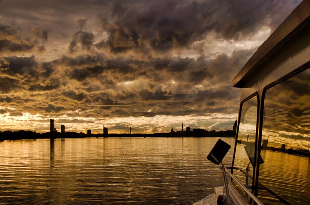 view of Old Riga from the boat at dawn