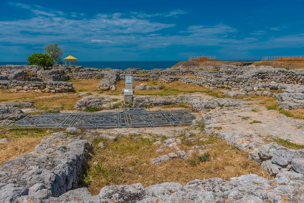 View of old ruins against cloudy sky