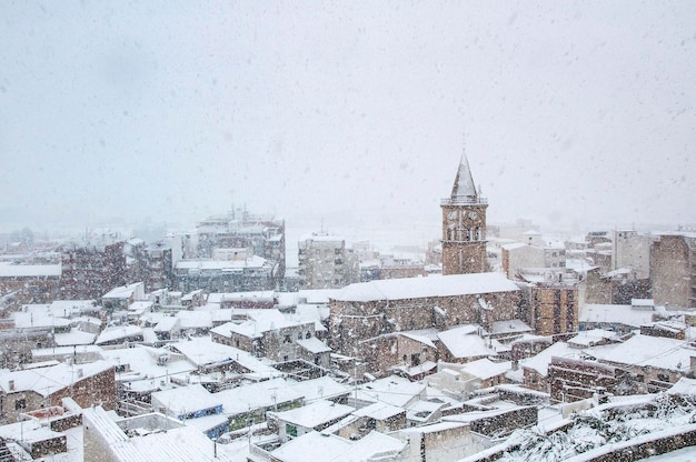 View of the old town of Villena during the snowstorm Church of Santa Maria and the rabal