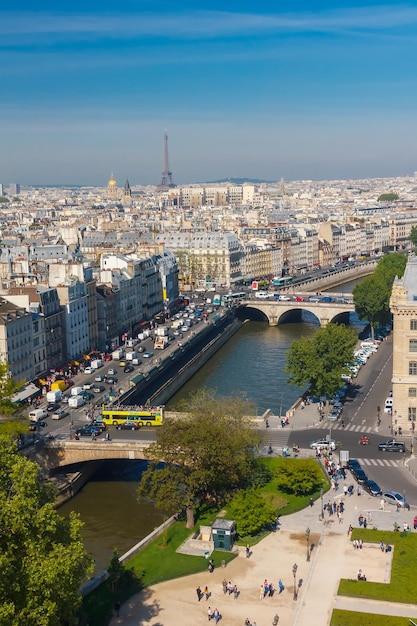 View of paris petit pont pont saintmichel and tour eiffel from\
notre dame cathedral