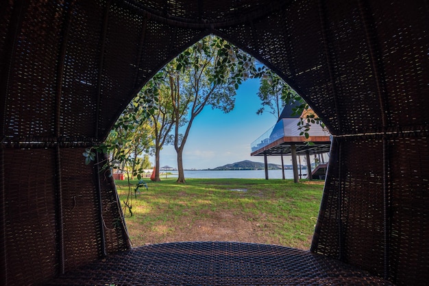 View of the park from inside a bamboo basket swing