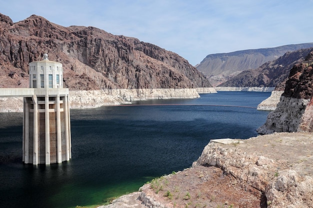 View of the pen stock towers over Lake Mead at Hoover Dam between Arizona and Nevada states USA