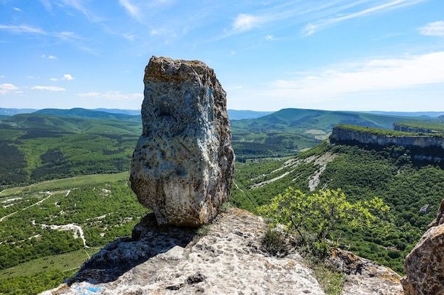 Вид на живописные крымские горы из пещерного городка ТепеКермен в летнем Крыму