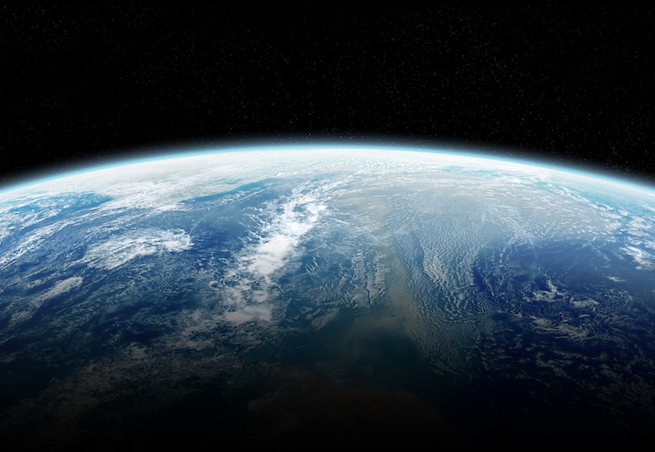 Photo 惑星地球のビューは、nasaから提供されたこの画像の日の出要素の間に大気でクローズアップ