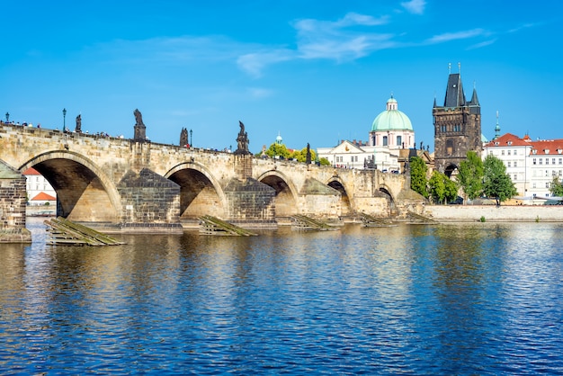 View of prague castle and charles bridge over vltava river, czech republic