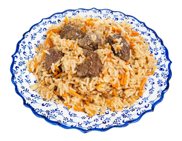 Above view of prepared pilau on ceramic plate