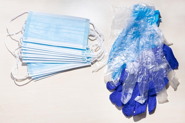 Above view of protective face mask and hand gloves