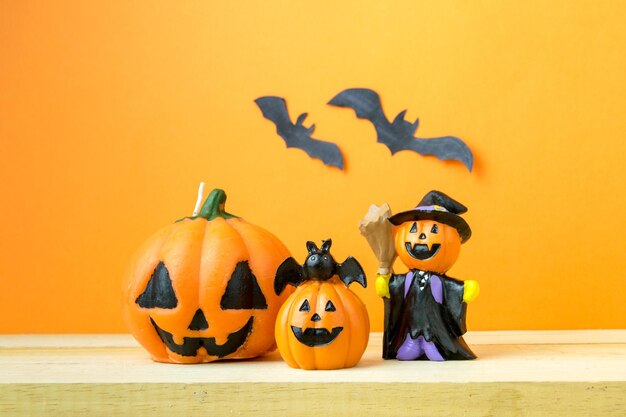 View of pumpkins against orange background