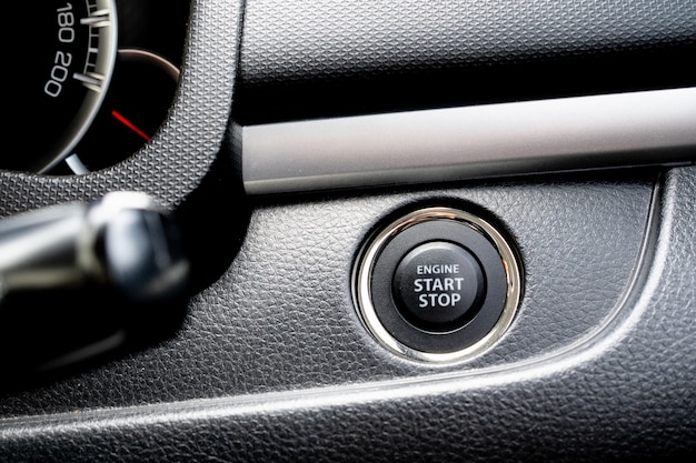 Photo view of push start or stop engine button.