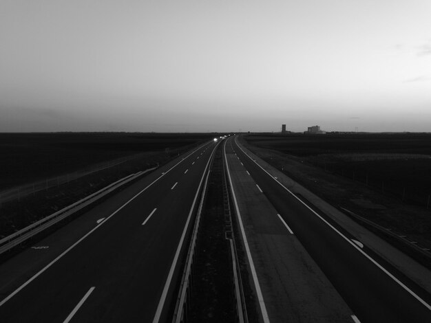 View of railroad tracks against clear sky