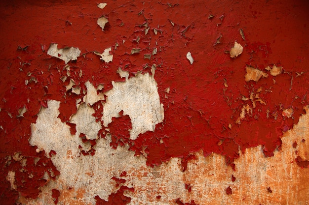 view on red surface of the wall of the old house