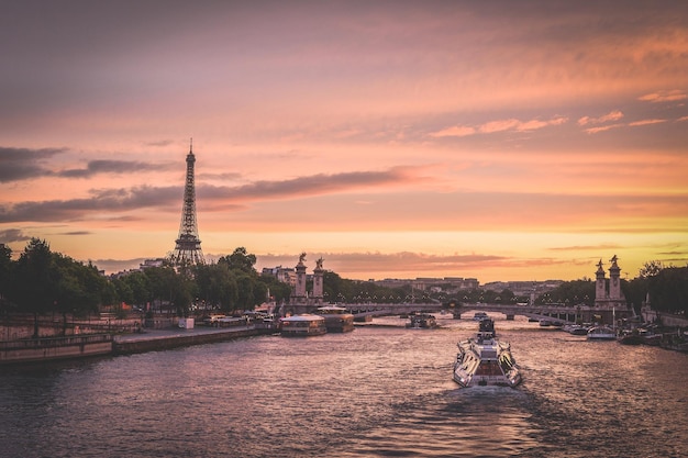 View of river against cloudy sky during sunset