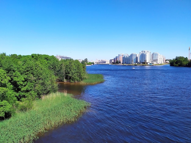 View of the river from the bridge the silhouette of St Petersburg city clear summer's day