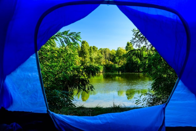 View on a river from tent in morning