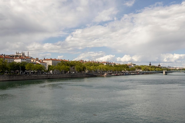 Photo view of the river and one of the bridges of lyon