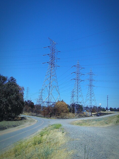 View of road against clear blue sky