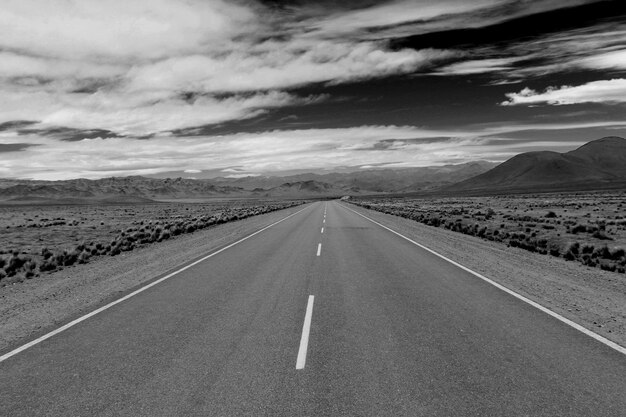 View of road against cloudy sky