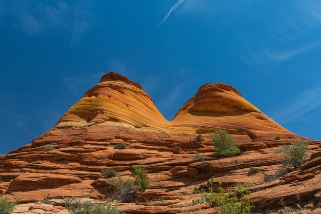 View of rock formation against blue sky