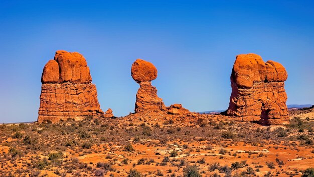 View of rock formations against blue sky