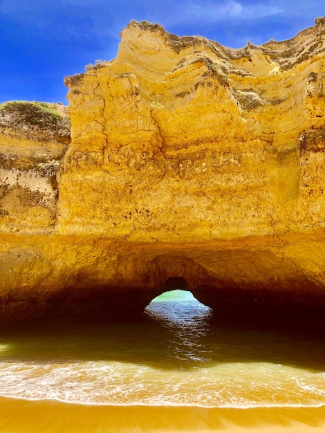 View of rock formations in sea