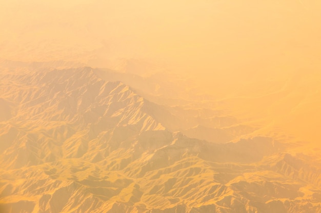 view of the sandy desert from an airplane