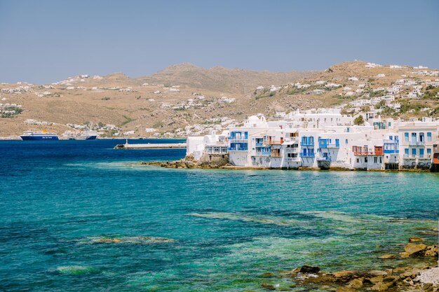 View of sea against buildings